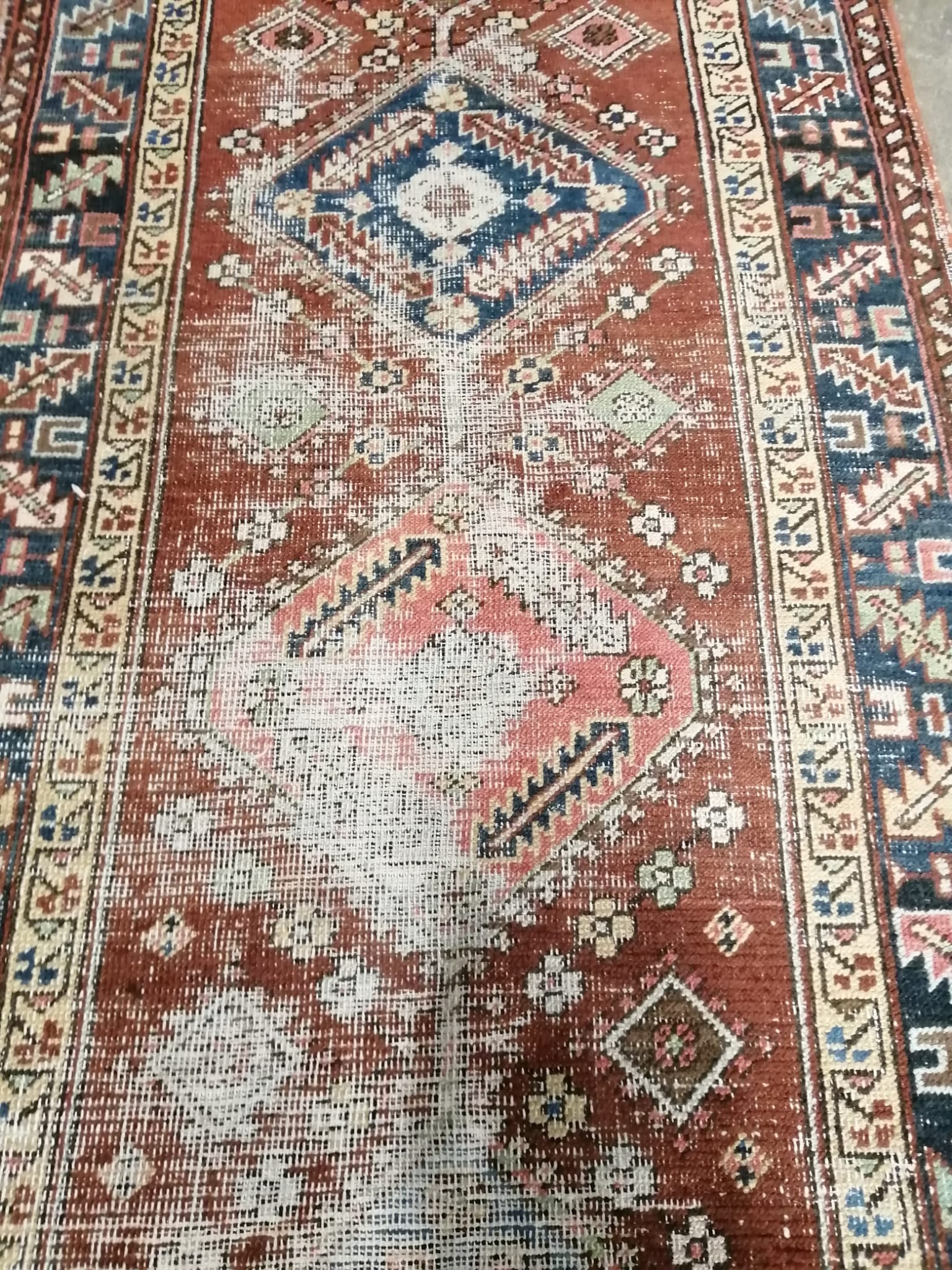 An antique Heriz runner, 362 x 95cm